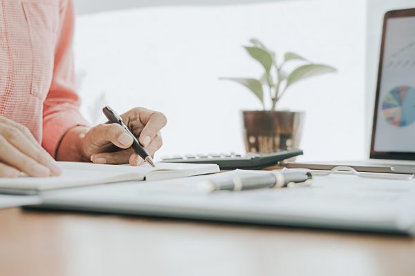 Business concept. Business people discussing the charts and graphs showing the results of their successful teamwork.
