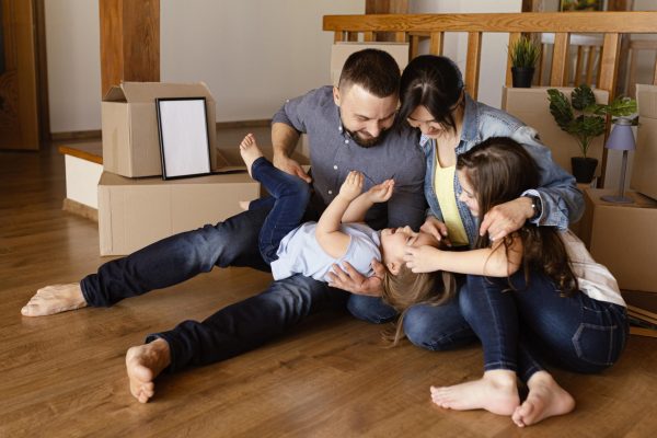 full-shot-family-playing-together